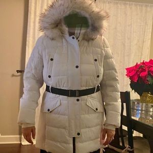 White Michael Kors puffer coat.